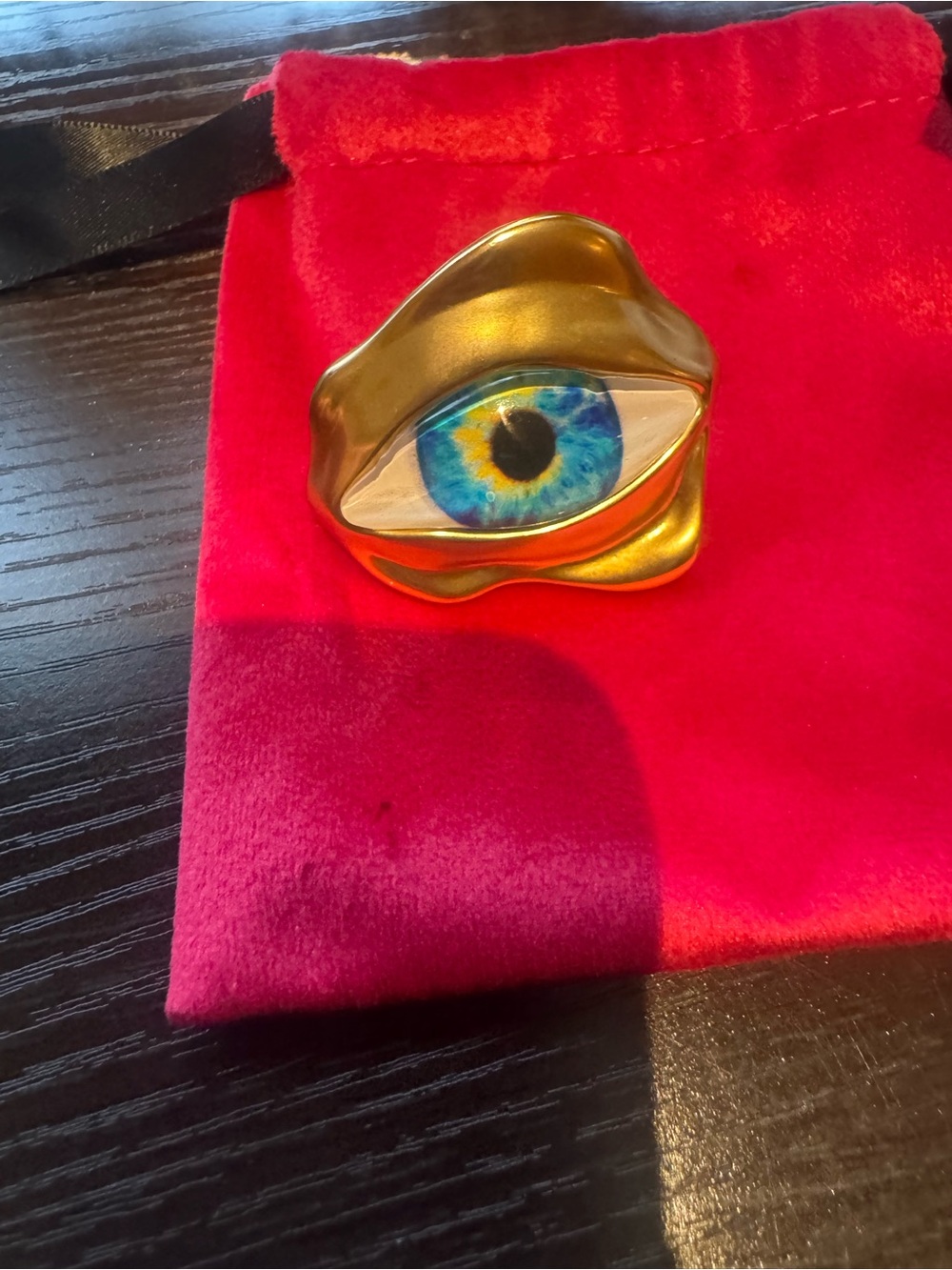 Schiaparelli  gold tone Eye Statement Ring with Blue Center adjustable
